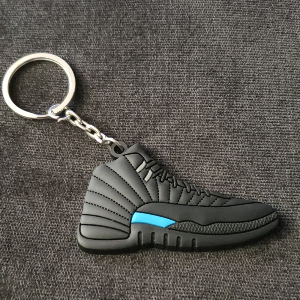 🔥 Jordan 12's (blk/blk w blu stop strip)Keychain